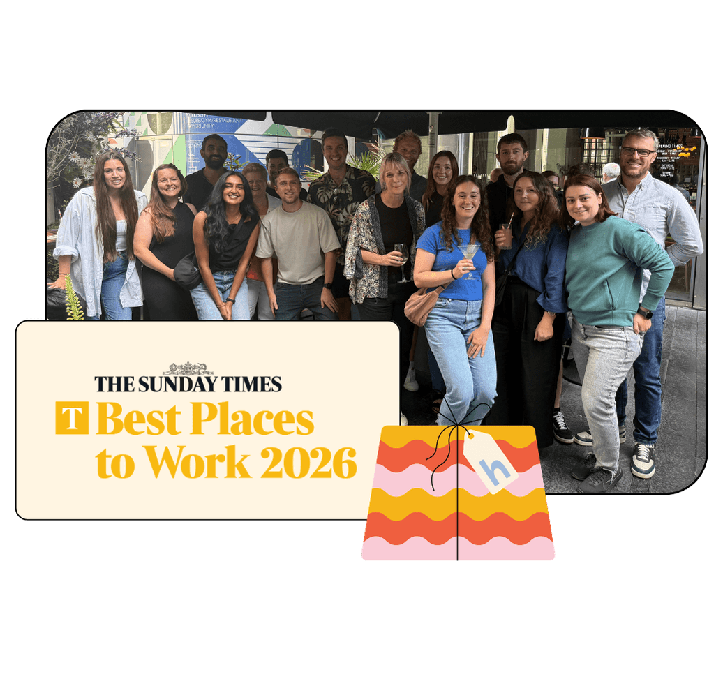 The Huggg team outdoors with the Sunday Times Best Places to Work 2026 badge